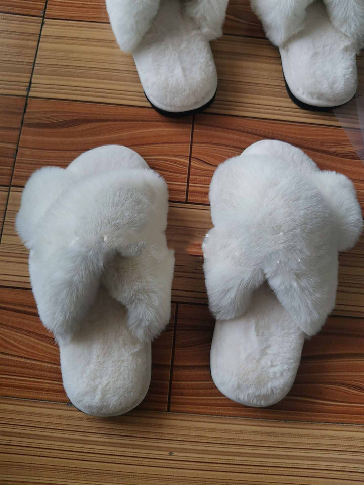 Fluffy faux fur criss-cross slippers in cream